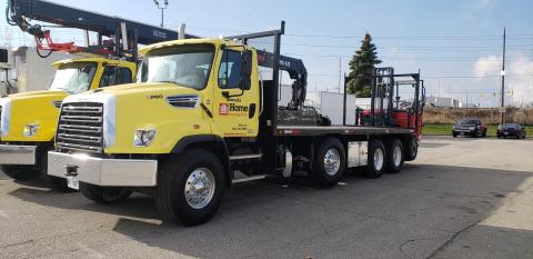 Freightliner 108SD Moffett truck delivered by Trinity Truck Sales