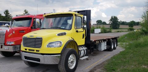 Freightliner 108SD Moffett truck delivered by Trinity Truck Sales