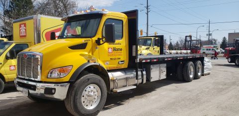 Peterbilt 548 Moffett truck delivered by Trinity Truck Sales