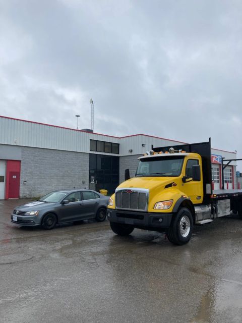Peterbilt 548 Moffett truck delivered by Trinity Truck Sales