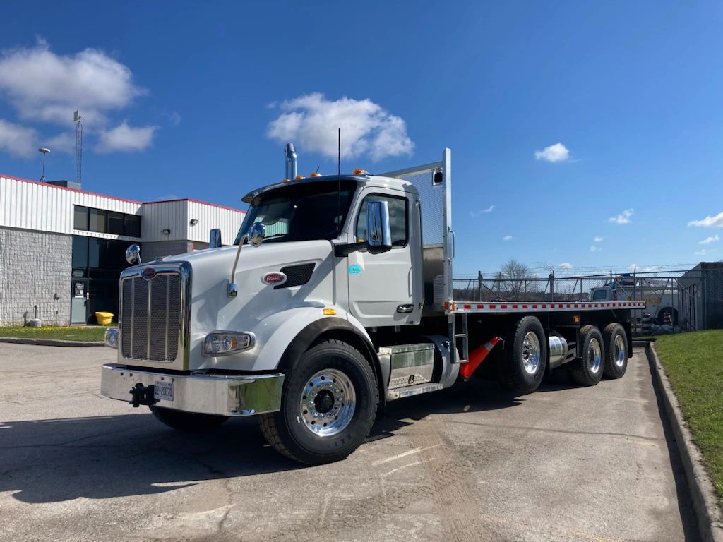 Peterbilt 548 Moffett truck delivered by Trinity Truck Sales