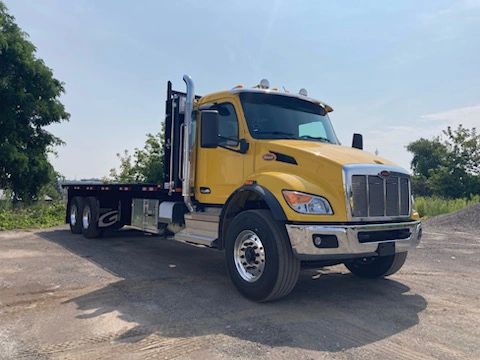 Peterbilt 548 Moffett truck delivered by Trinity Truck Sales