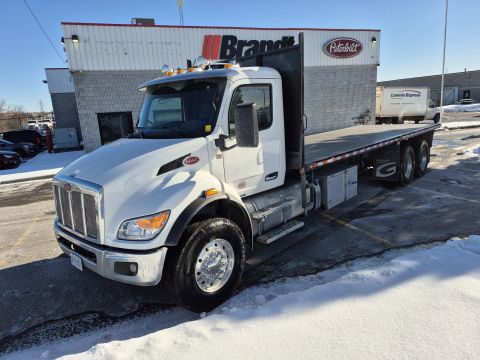 Peterbilt 548 Moffett truck delivered by Trinity Truck Sales