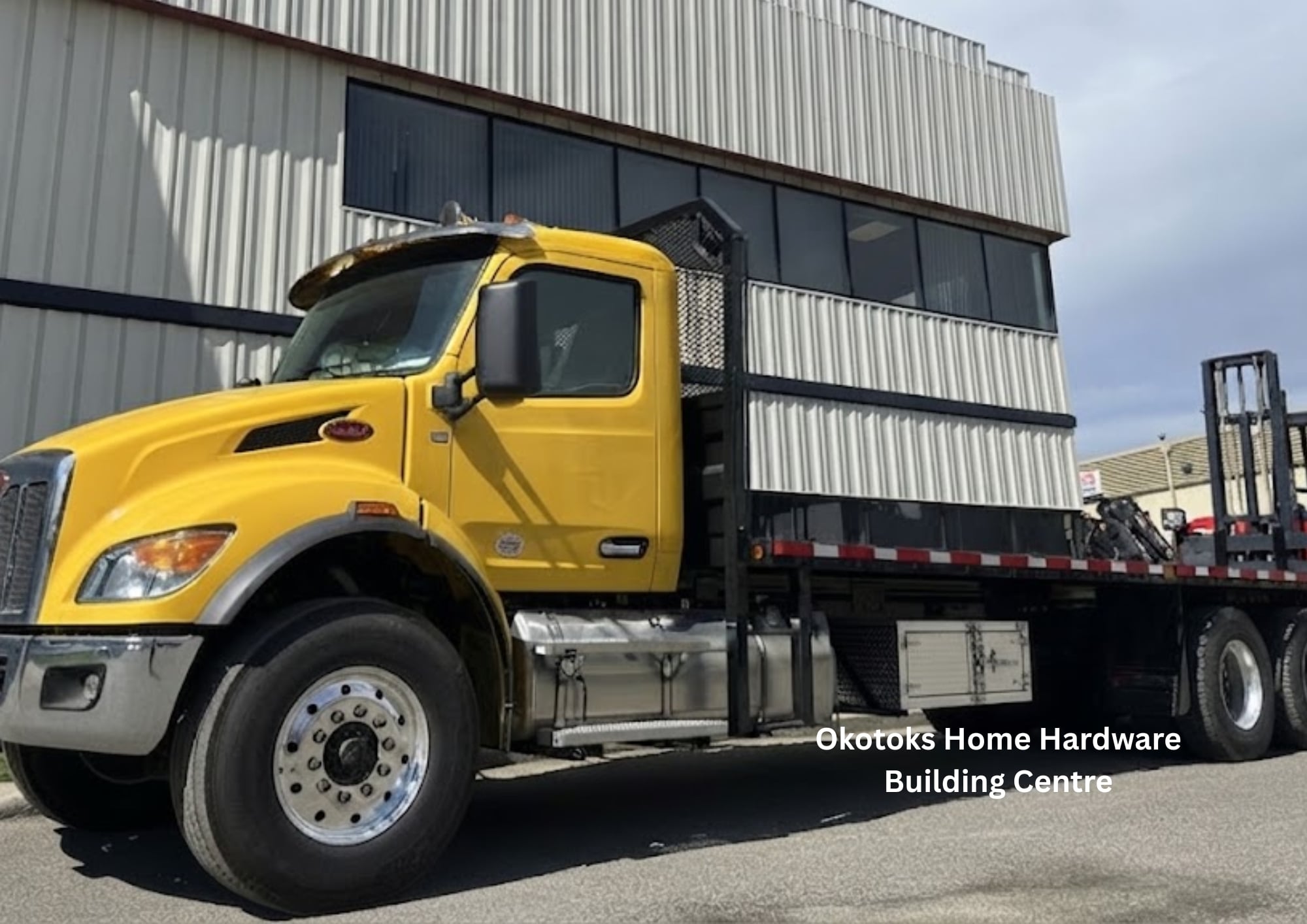 Peterbilt 548 Moffett truck delivered to Okotoks Home Hardware