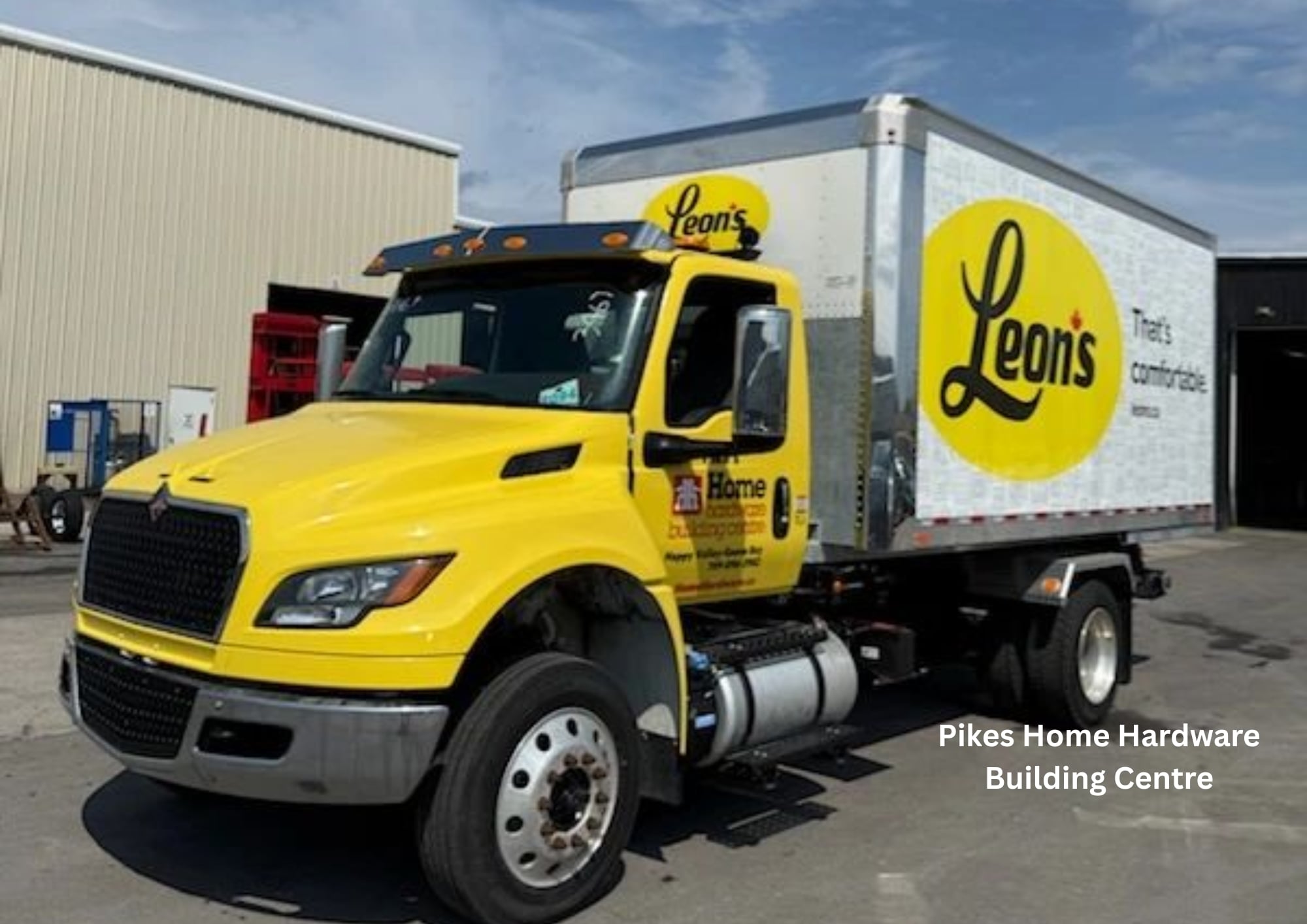 Kargo King roll-off truck with furniture box body delivered to Pikes Home Hardware, hauling for Leon's